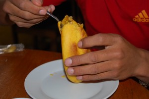 Eating a Salteña