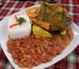 Seco de Cordero and Frijoles with Rice