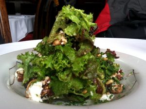 Fresh Cicciolina Salad with Pine Nuts, Goat Cheese, Pecans, and Aguaymanto (Photo: Wayra)