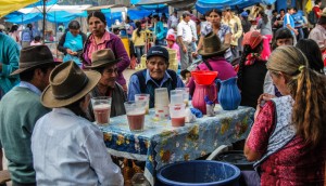 Drinking Frutillada in Limatambo's Fair (Photo: Wayra)